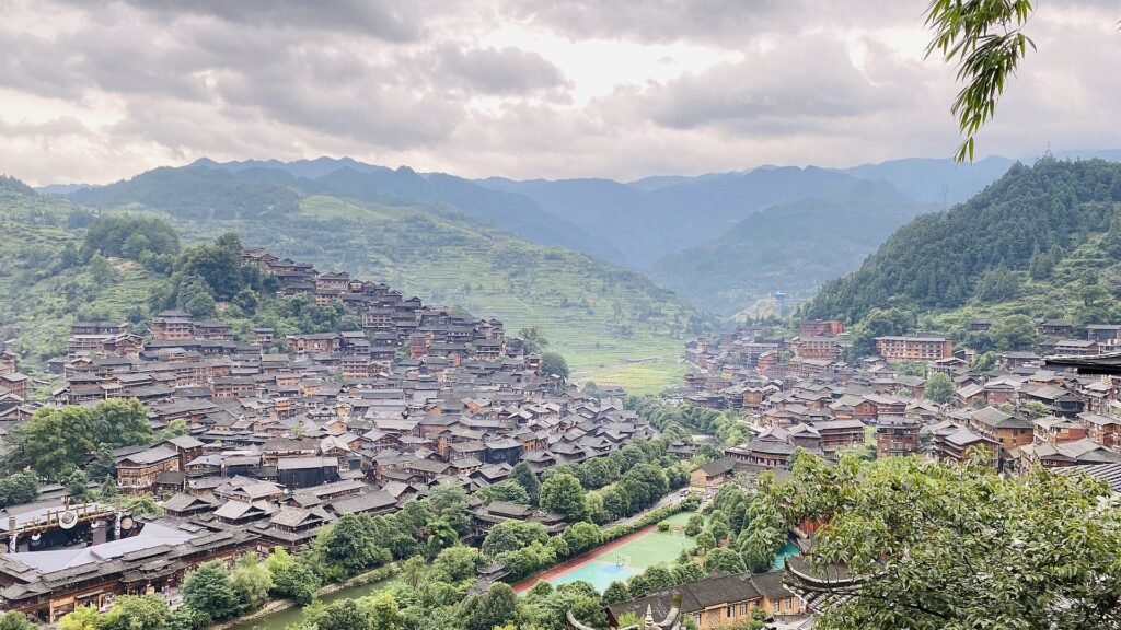 Xijiang Qianhu Miao Village in Guizhou, seen from the hillside above the valley