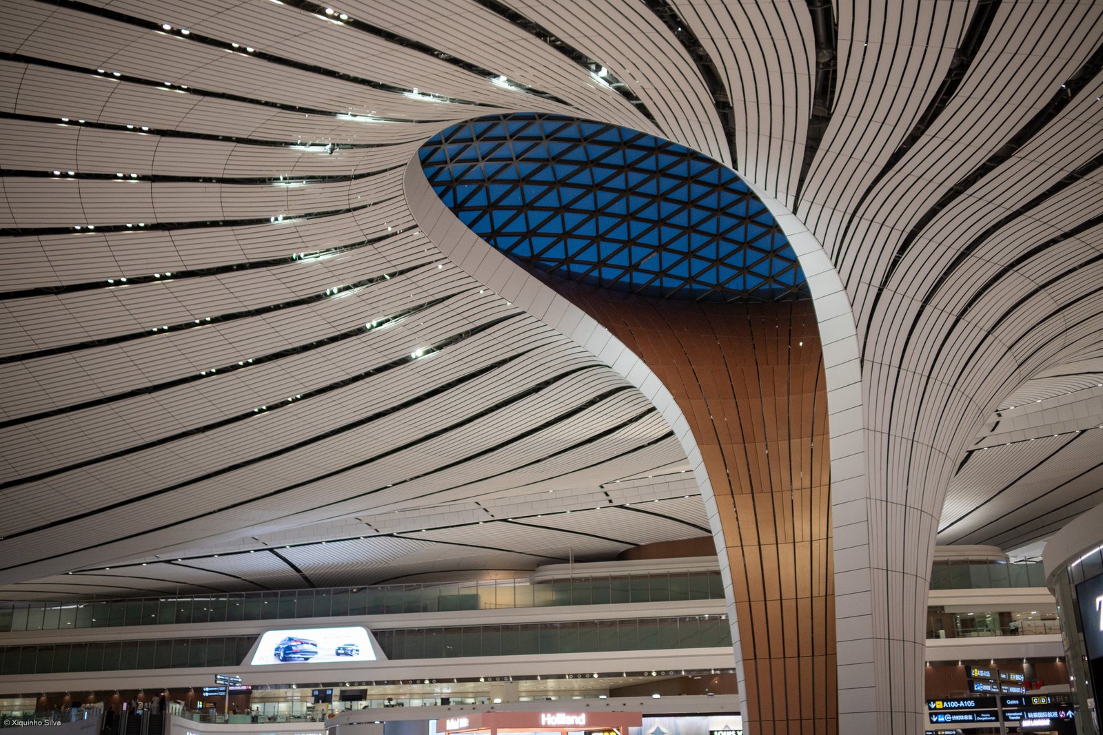 The vast interior of the terminal at Beijing Daxing International Airport