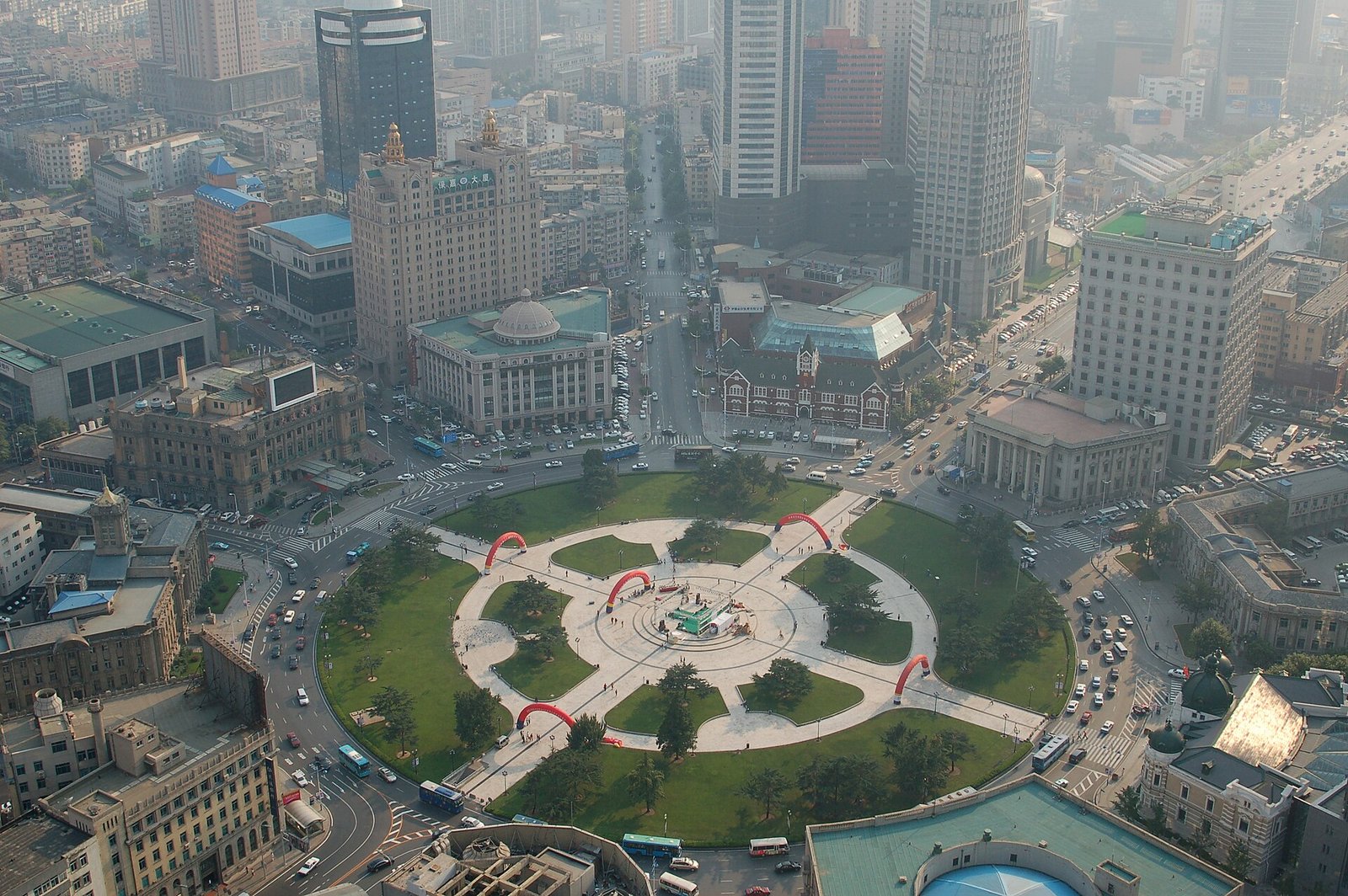 An aerial view of the circular Zhongshan Square in Dalian, eight roads radiating out and European-style buildings ringing the centre