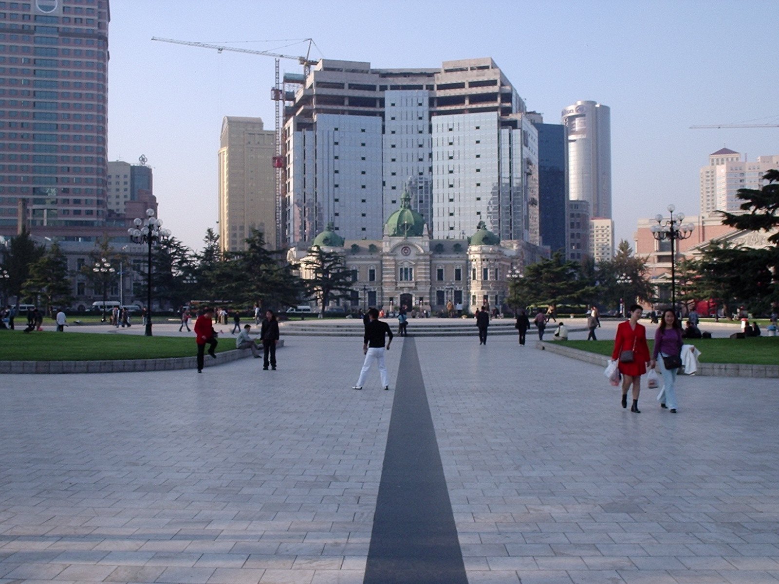 The Bank of China building on Zhongshan Square in Dalian, a stone classical facade with columns and a pediment