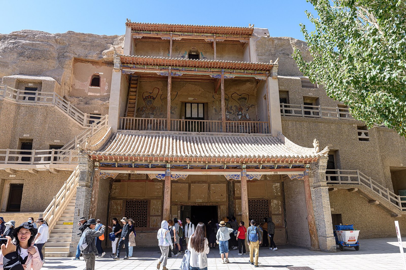 The painted timber entrance to Caves 16 and 17 at the Mogao Caves near Dunhuang