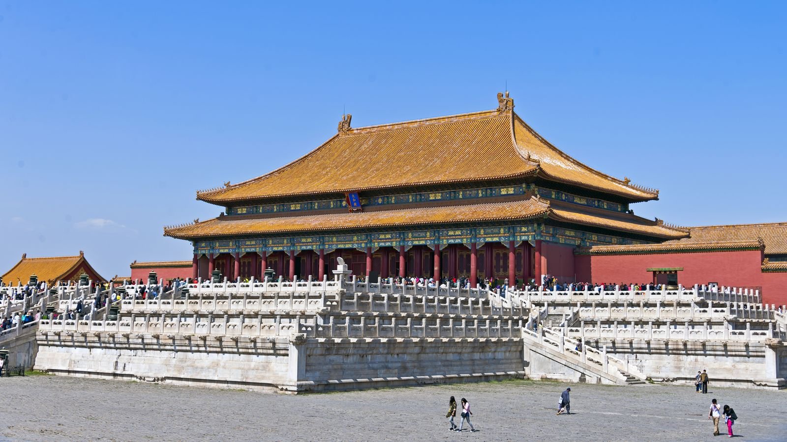 The Hall of Supreme Harmony in Beijing's Forbidden City, on its white marble terrace under a blue sky