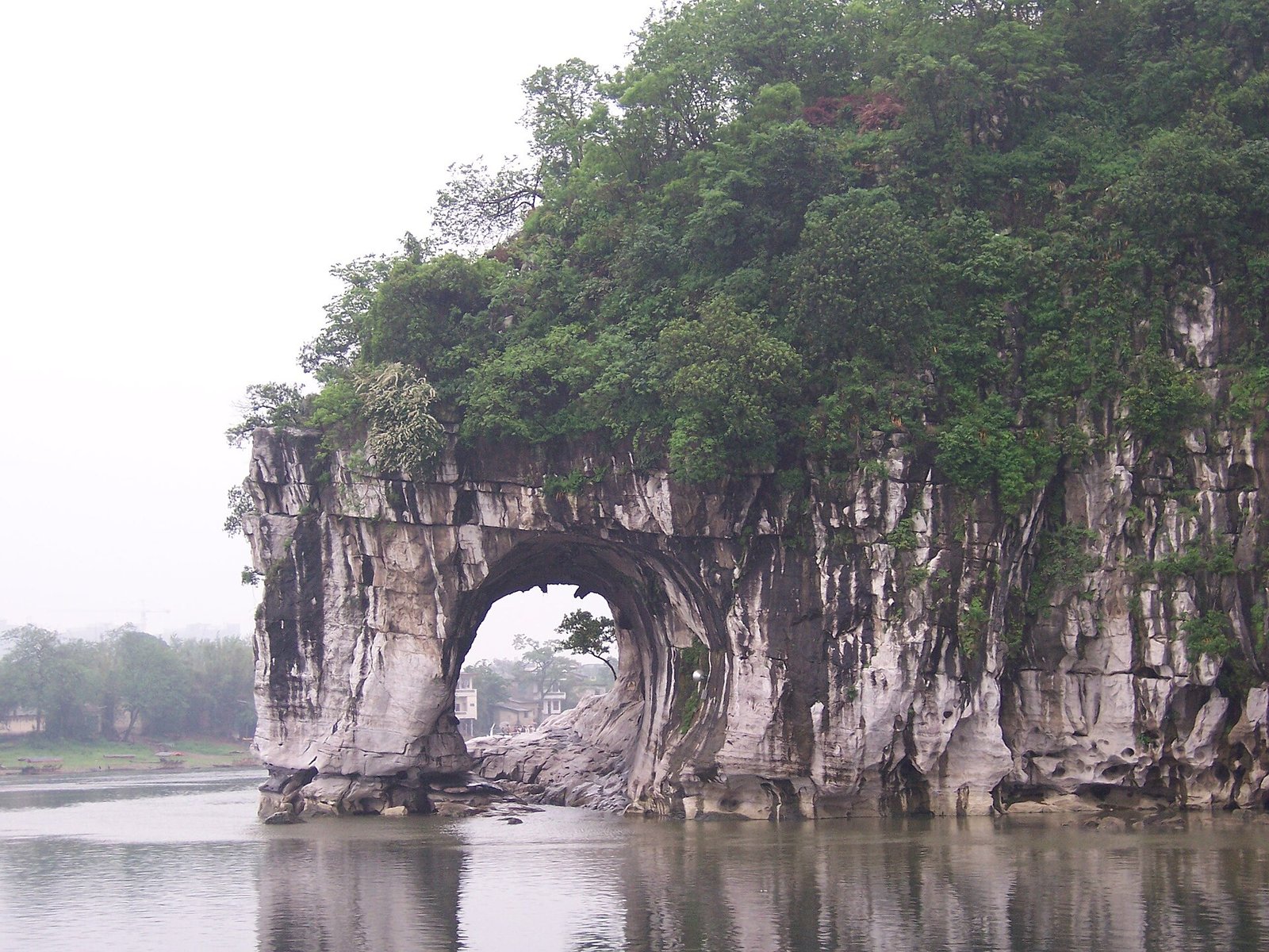Elephant Trunk Hill, a karst rock arch at the water's edge in Guilin