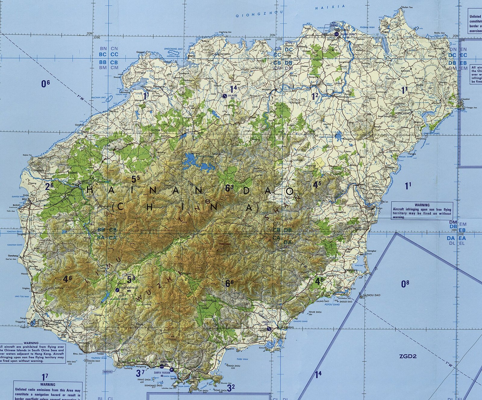 A shaded-relief topographic map of Hainan showing mountains in the centre and south-west and coastal plains around them