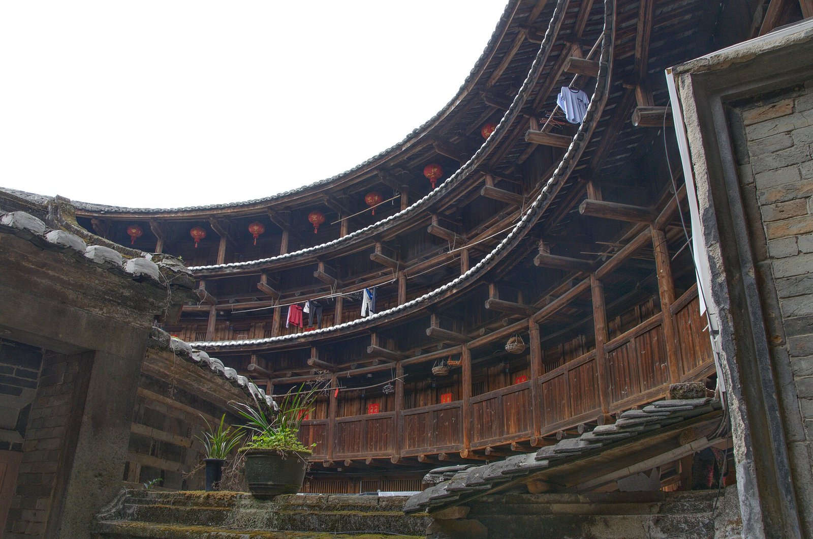 The round earthen outer wall and entrance gateway of Huaiyuan Lou at Yunshuiyao, Nanjing County, Fujian