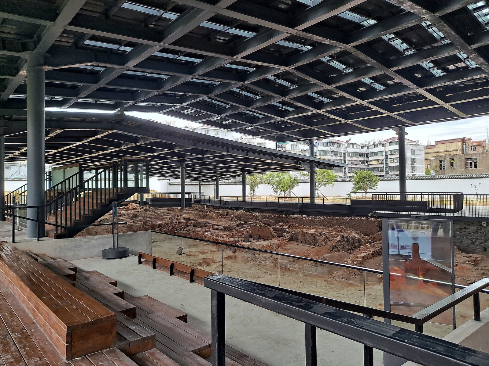 Excavated foundations under a protective shelter at the imperial kiln site in Jingdezhen