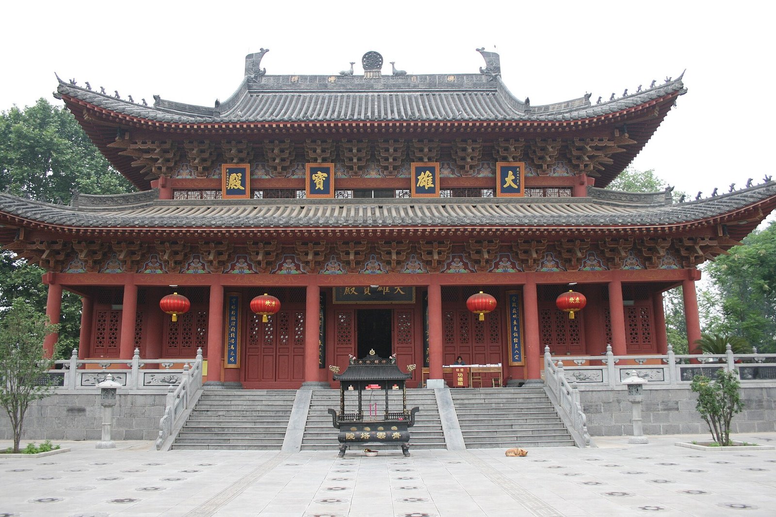 The Great Buddha Hall of the White Horse Temple in Luoyang, its red timber front hung with lanterns