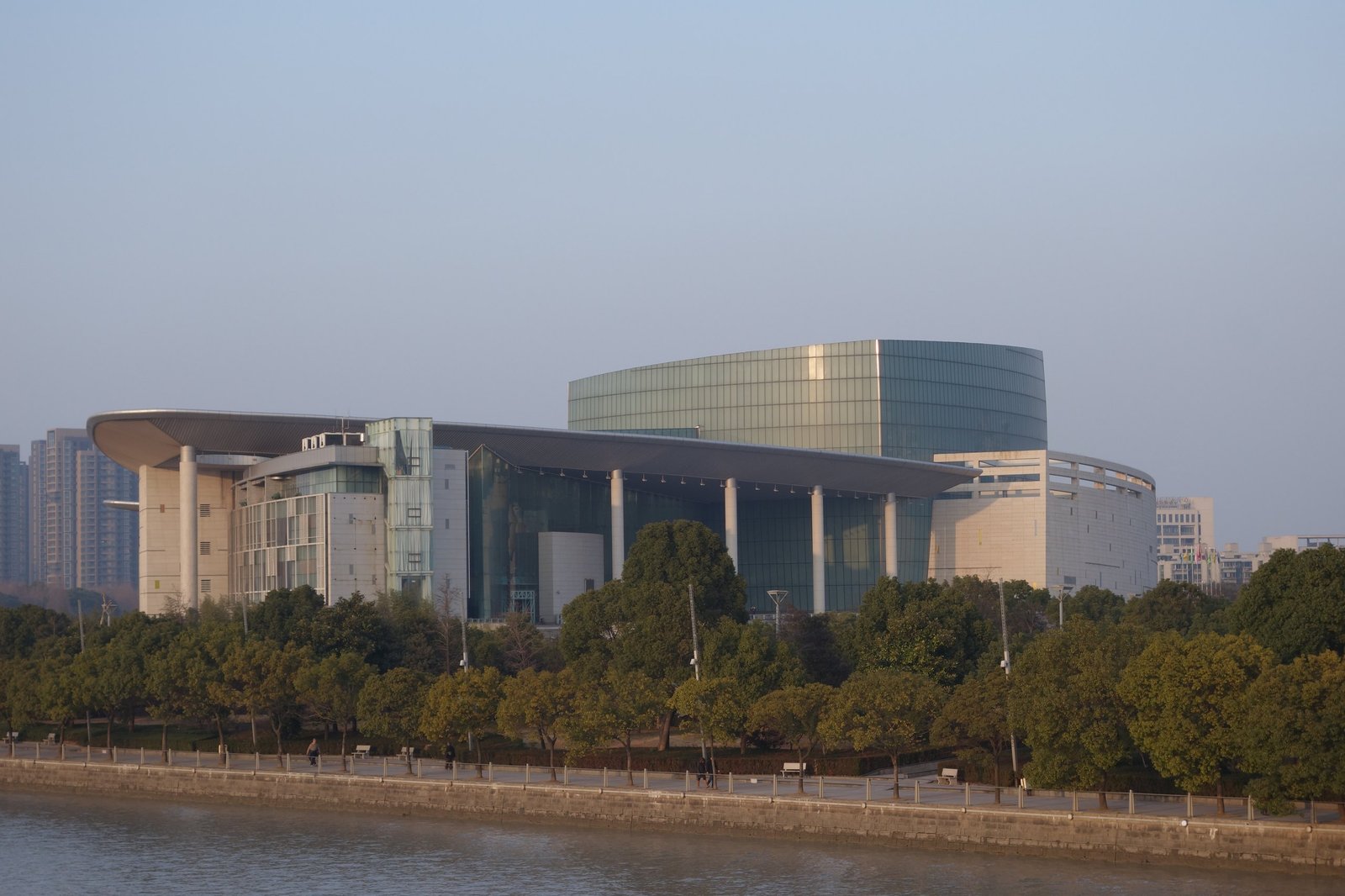 Ningbo Grand Theatre, a curved riverside concert hall on the Yaojiang River in Jiangbei district