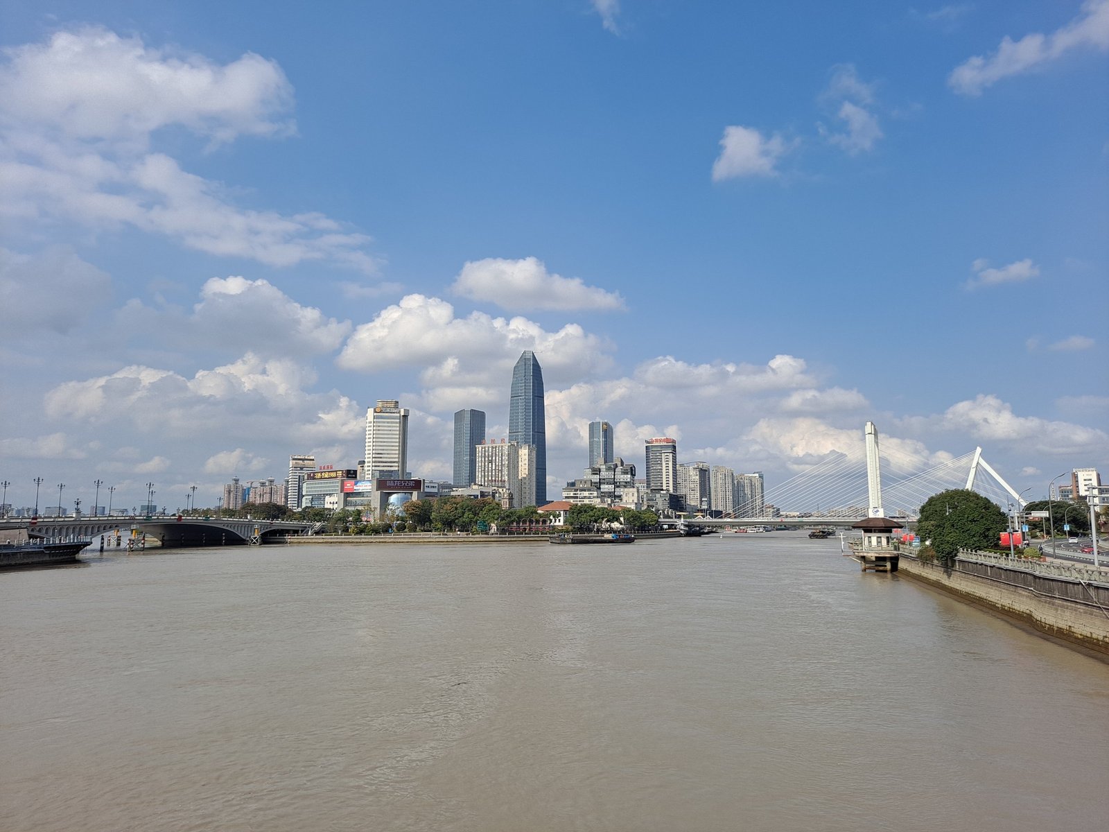 The confluence of three rivers at Sanjiangkou in central Ningbo, with the city skyline behind