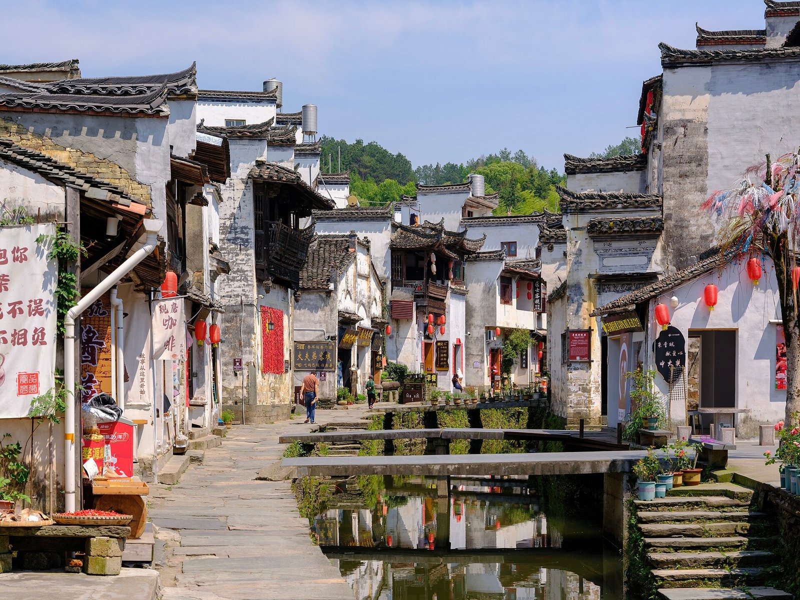 The stone-paved canal street at Likeng in Wuyuan, with whitewashed Huizhou houses on both sides