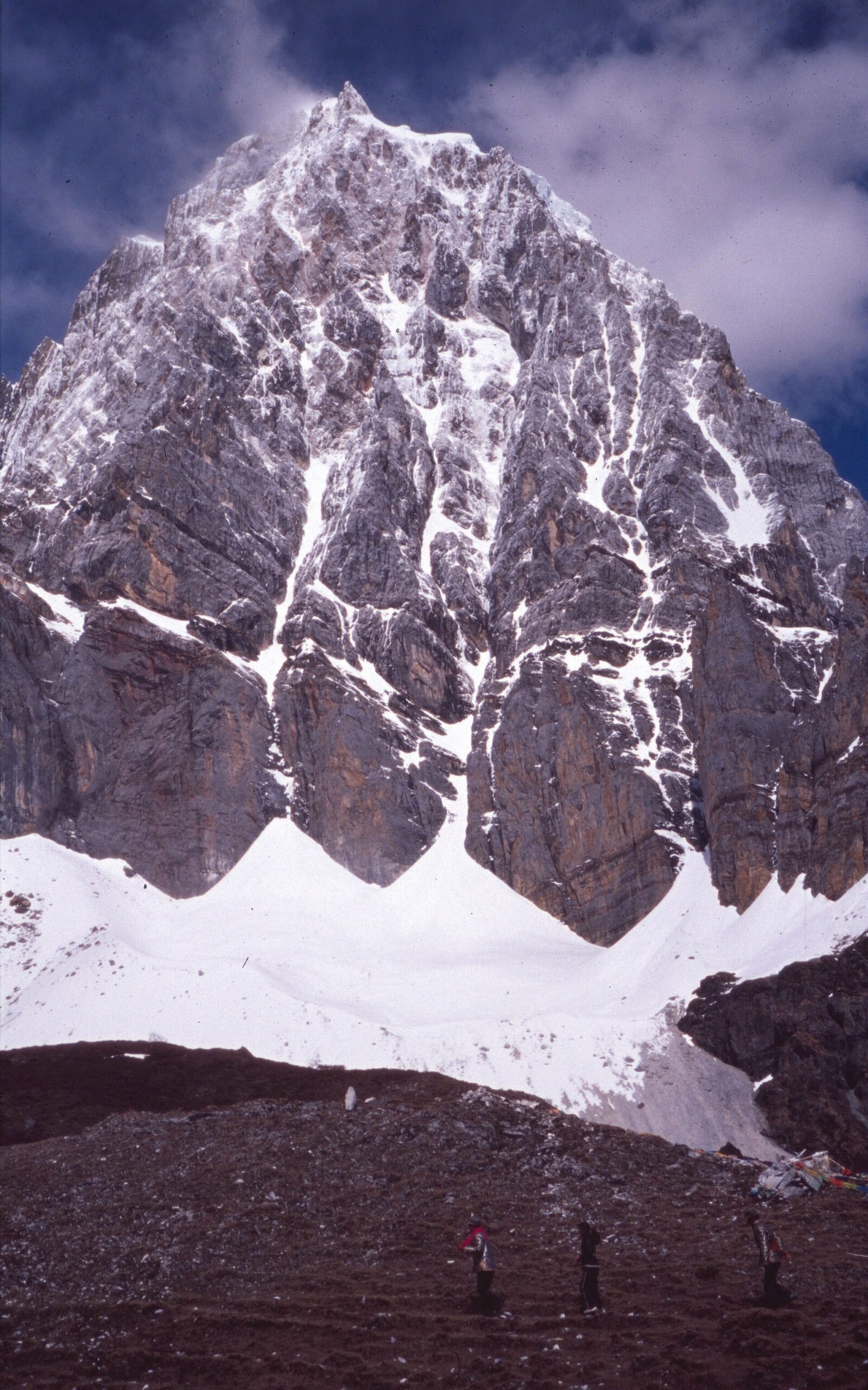 The rock and snow face of Chana Dorje, the eastern of the three protector peaks at Yading